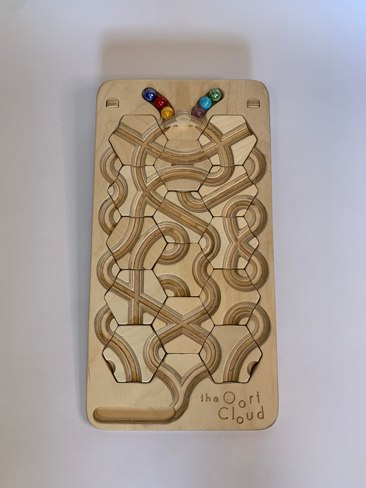 The Oort Cloud: A Marble Run Puzzle Game